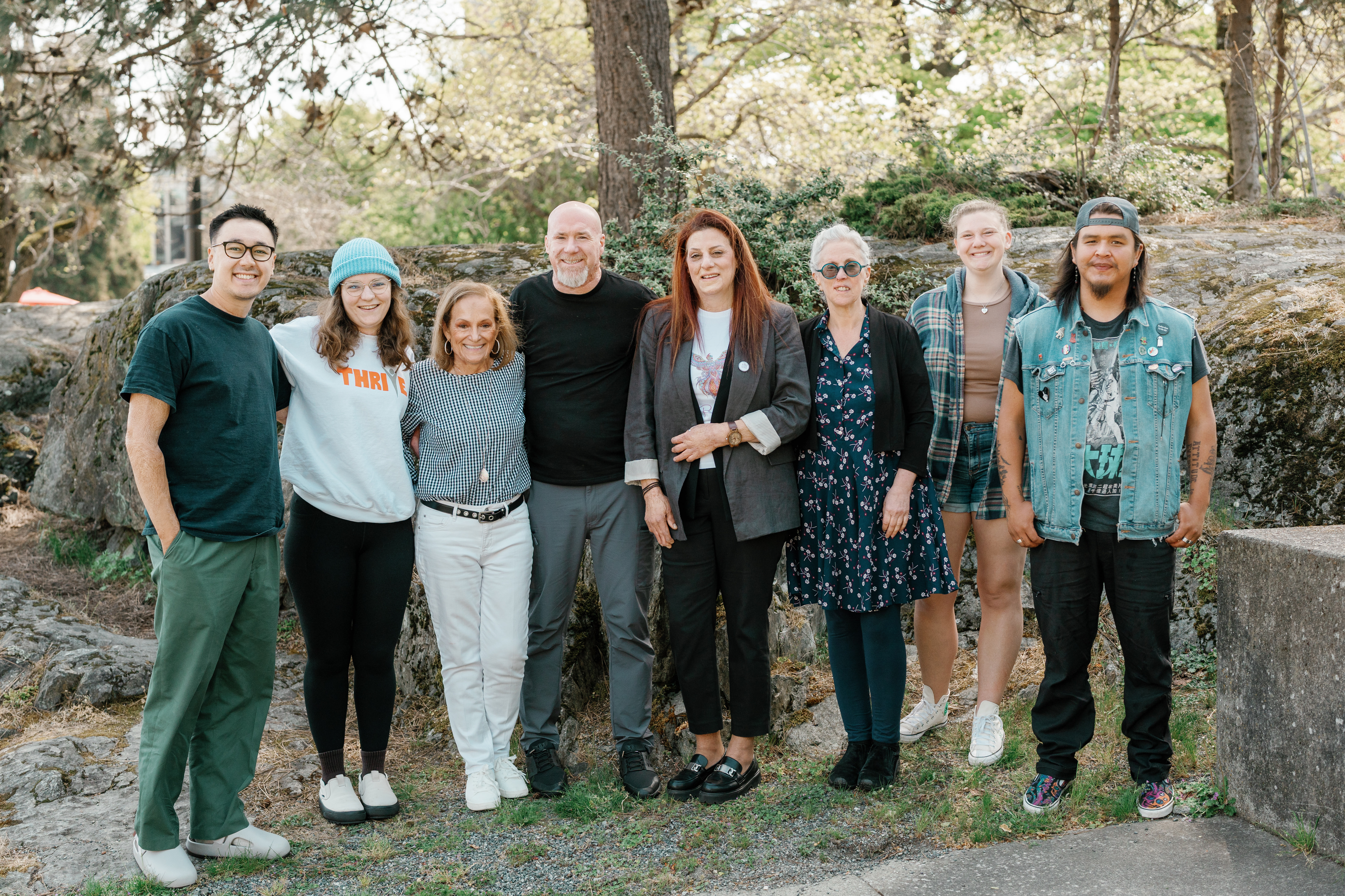 Eight members of the CBSC community standing together outdoors at the National Forum