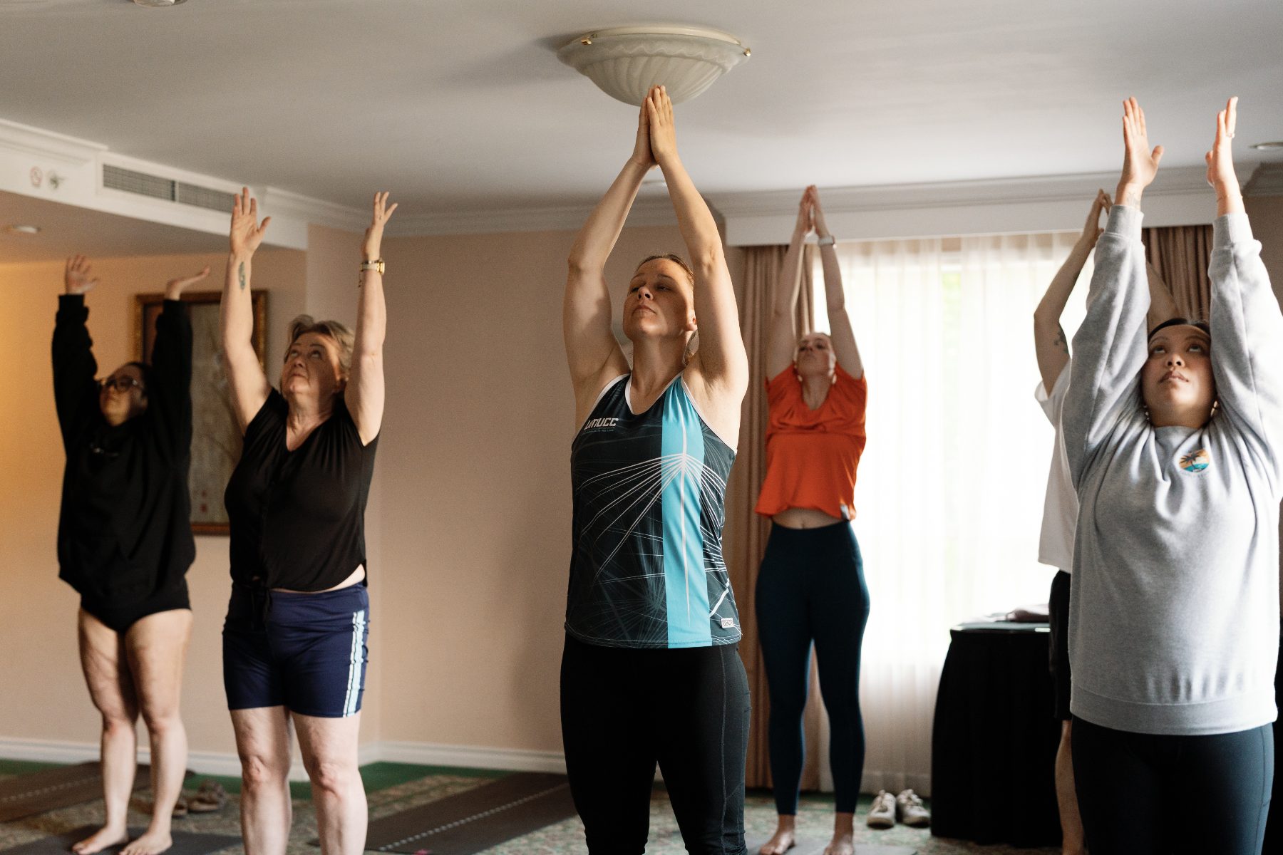 A morning yoga session at the 2025 Forum